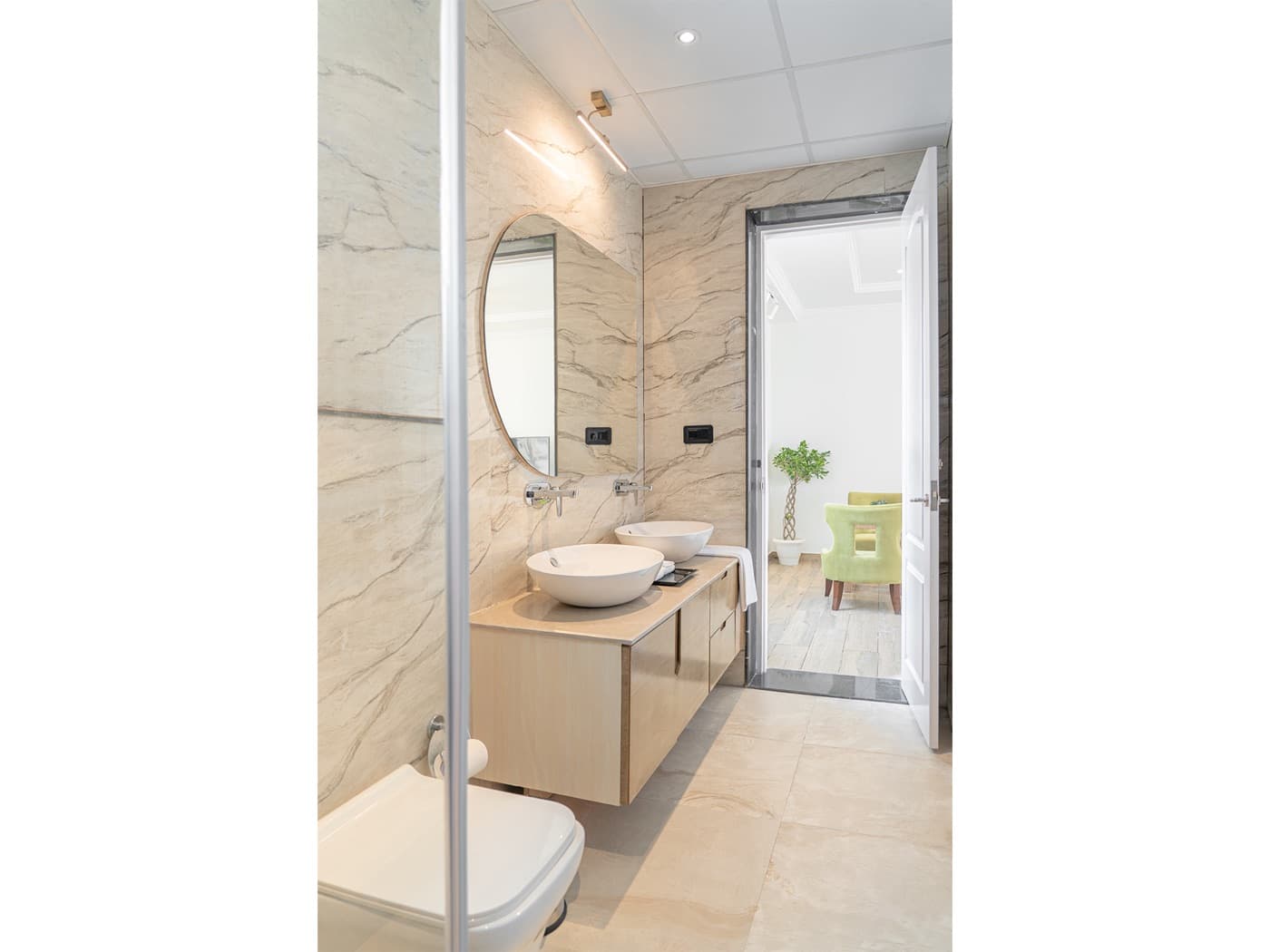 Attached bathroom with modern fittings